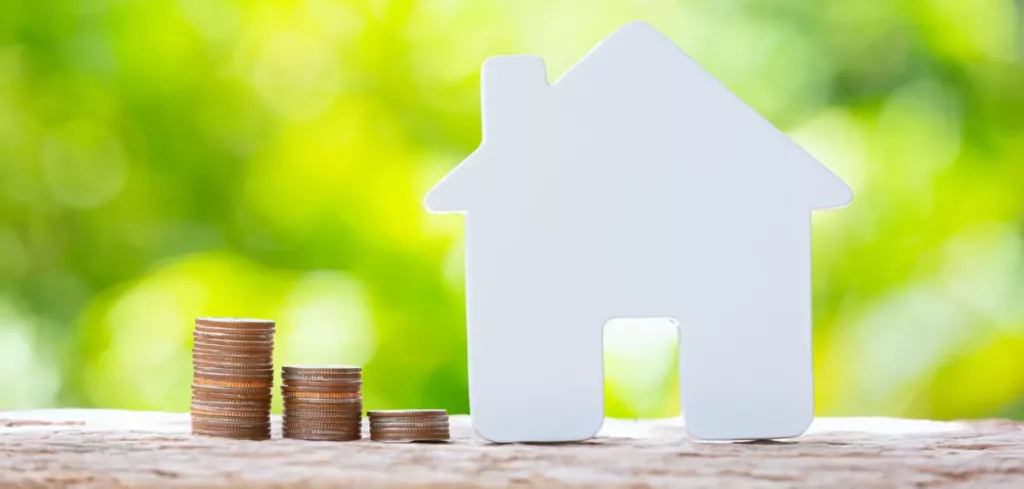 World Habitat Day Close Up Picture Pile Coins Model House Scaled